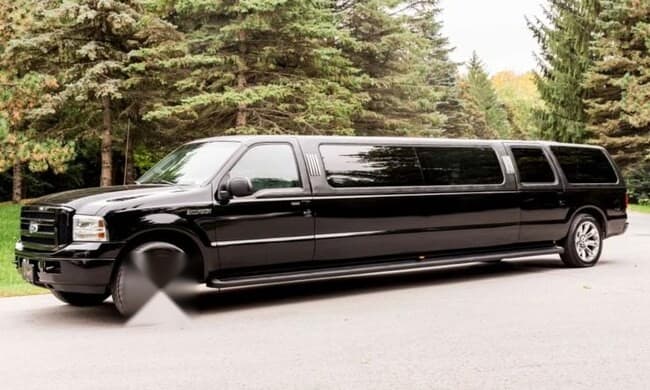 Black stretch SUV limousine, three-quarter exterior, Montreal